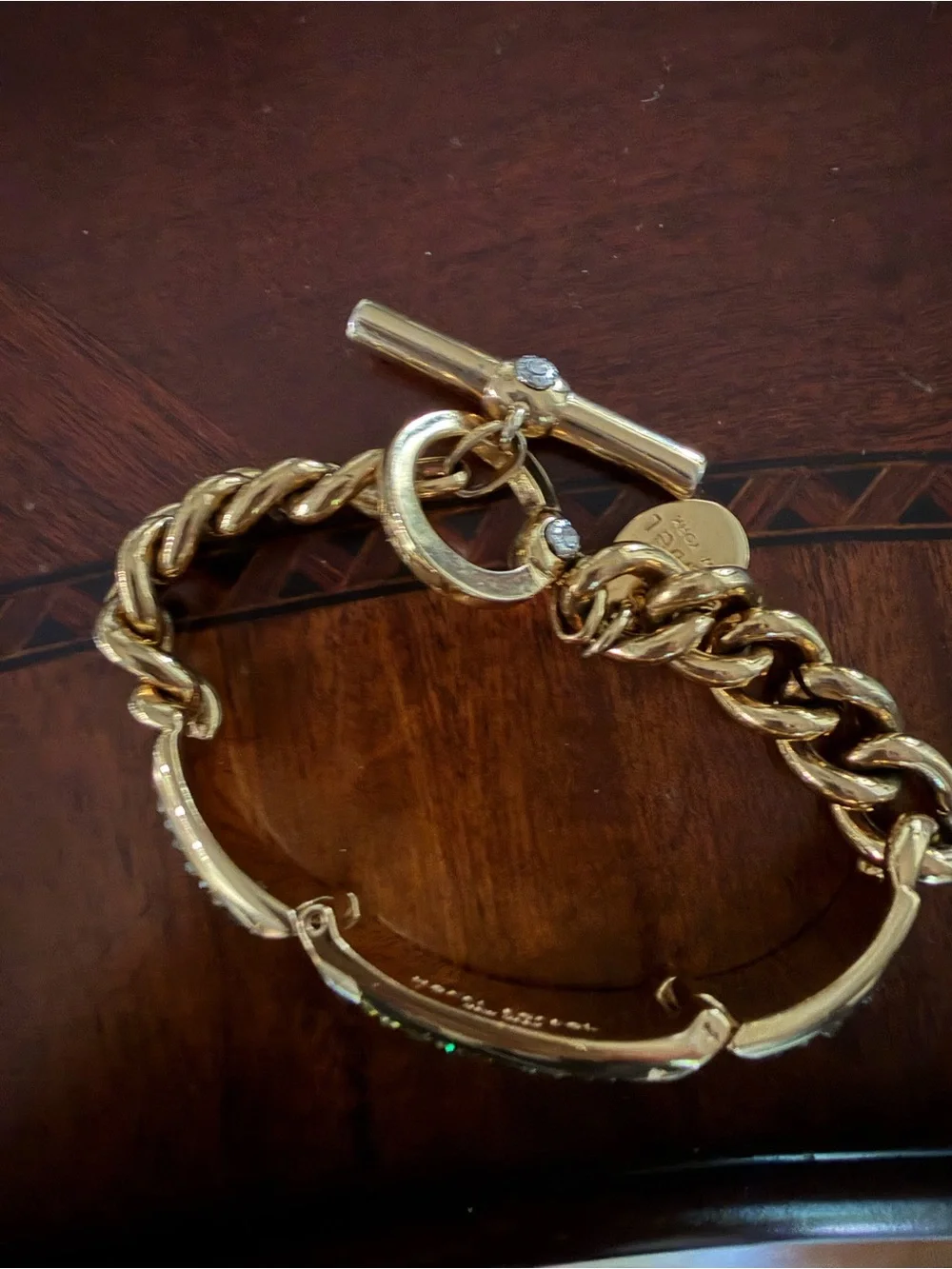 Henri Bendel Gold Tone Bracelet with Green Crystals Toggle Closure 7.5”